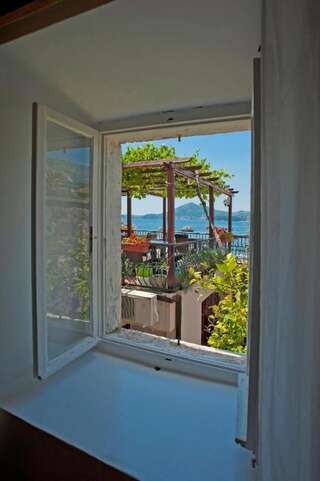 Апартаменты Apartments Porat Свети-Стефан Номер-студио с видом на море-25